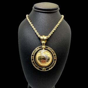 10k gold large spinning globe “world is yours” pendant