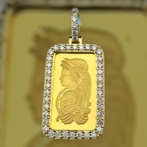 24k gold centre 10k border .9 carat weight vs natural suisse diamond pendant