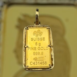 24k gold centre 10k border .9 carat weight vs natural suisse diamond pendant