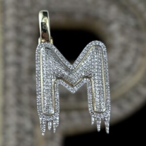 drippy “m” diamond pendant