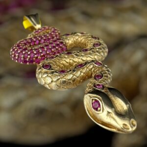 10k gold magenta snake pendant